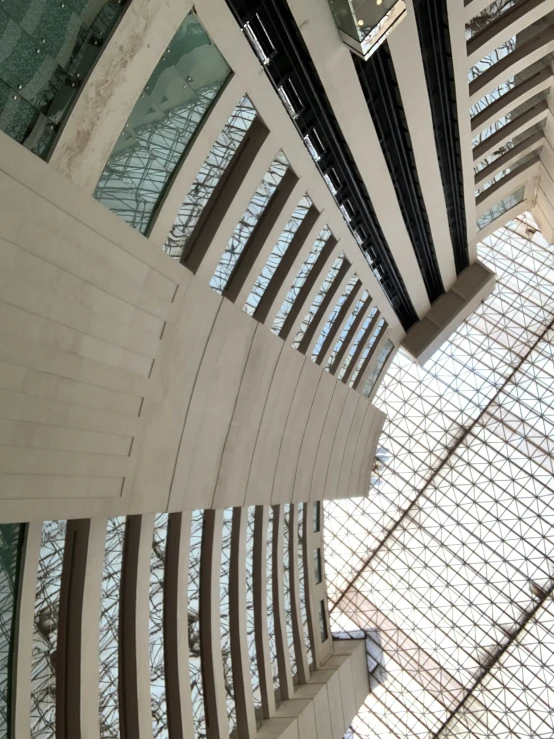 the inside of an interior building with large windows