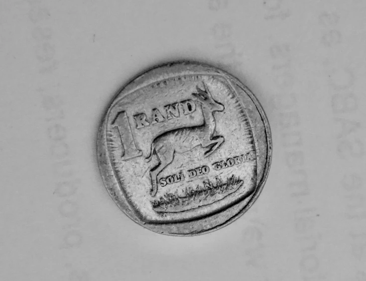 a vintage stamp on the back of a coin