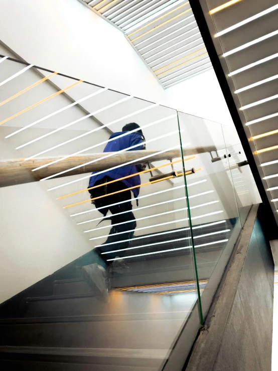 a person riding a skate board up a stairwell