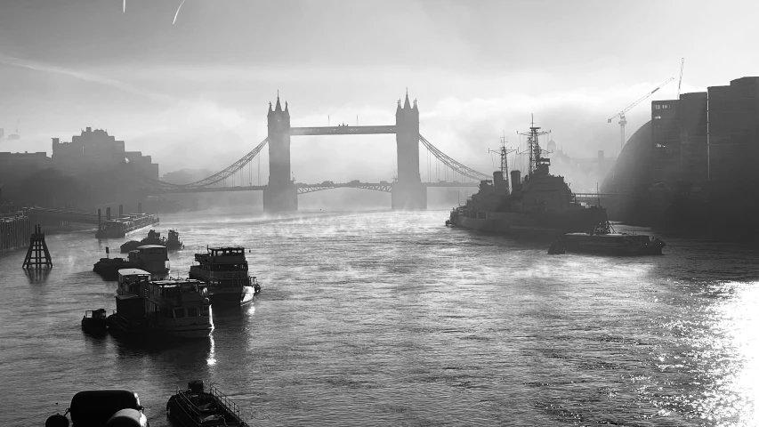 a black and white po of boats in a harbor