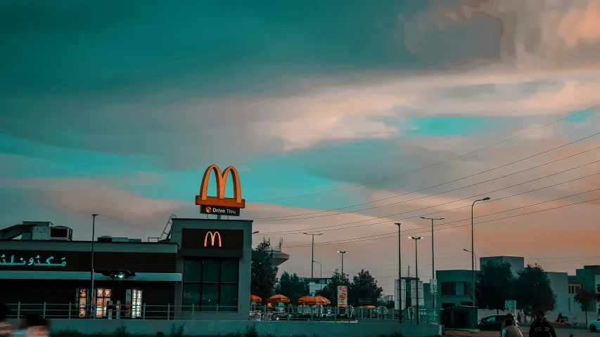 the sky above a mcdonald's restaurant during sunset