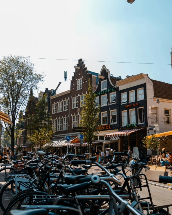 there are many bikes parked along the street