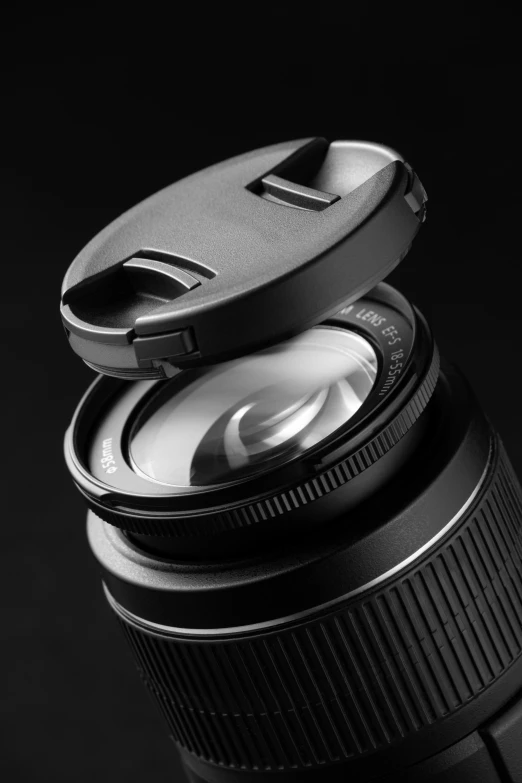 an image of a camera lens open to view it