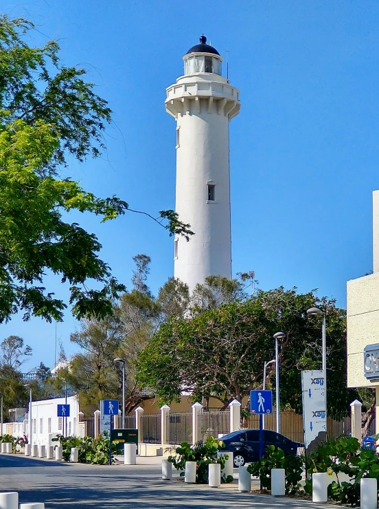 the tower is tall and has two light towers