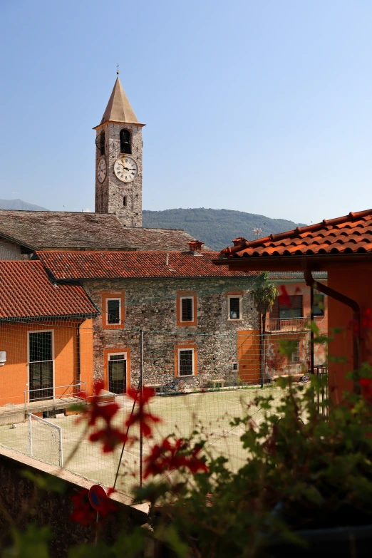 an orange building with a clock tower