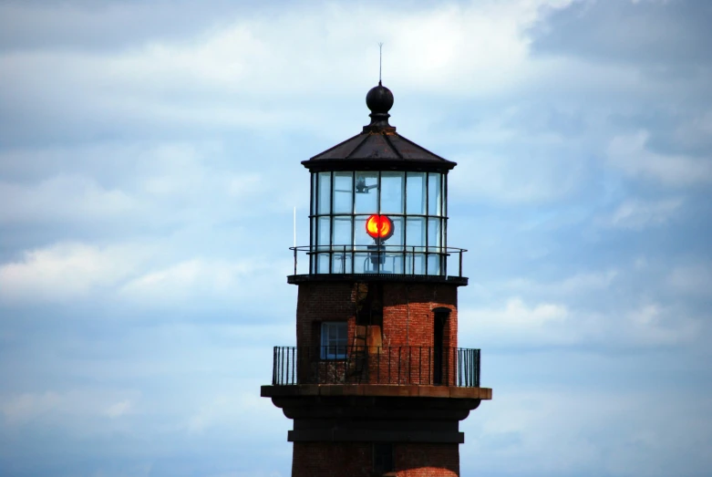 a lighthouse with a small light in it