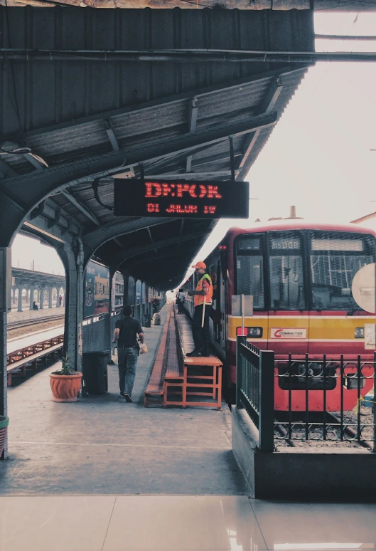 there is a train waiting at the station