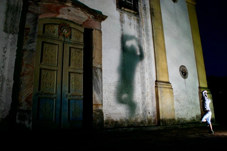 shadow cast from a door on a building