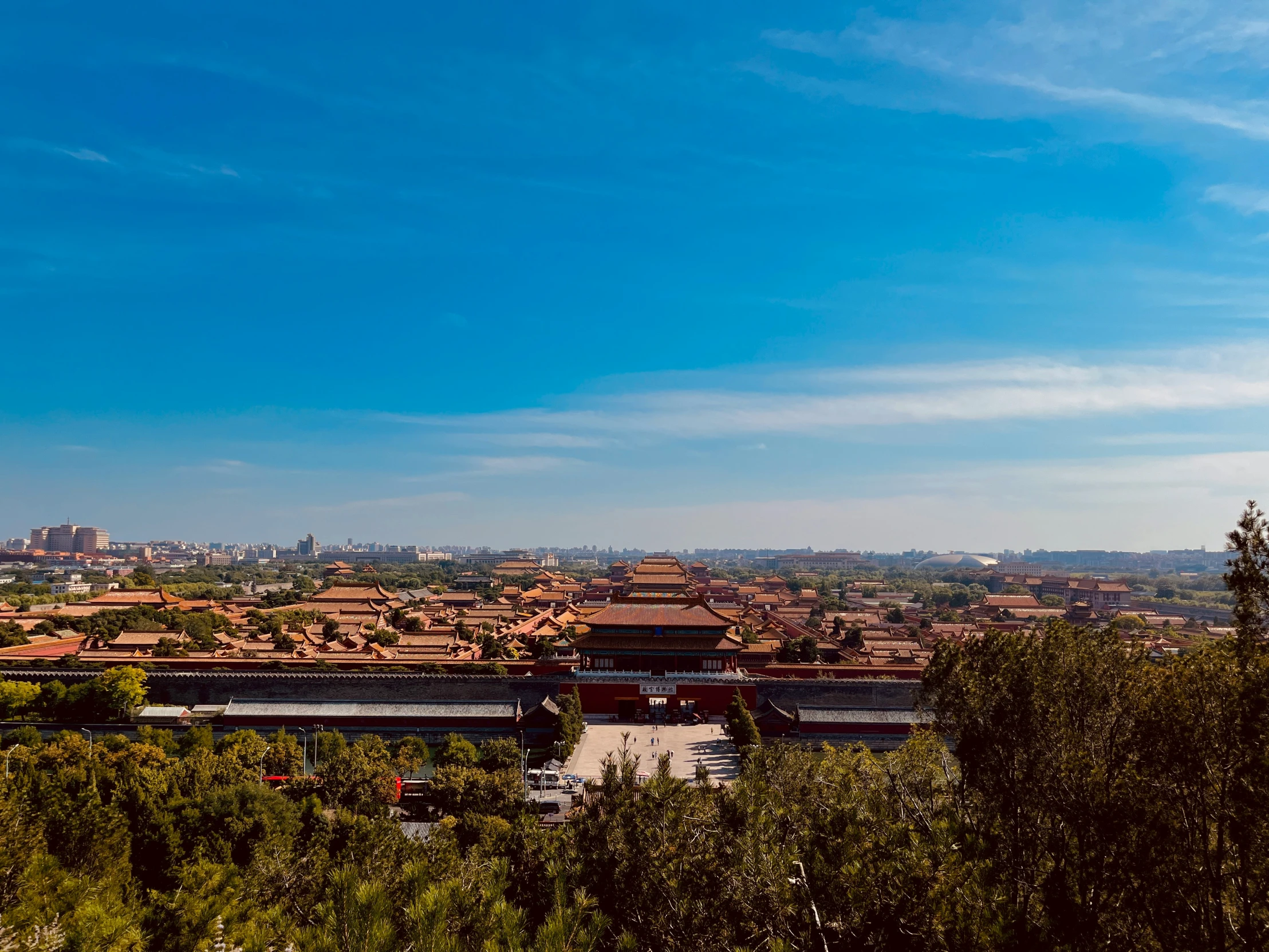 an outdoor area with a city in the background