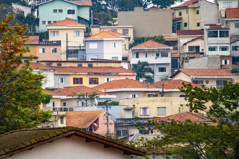 buildings with orange roofs are in the city