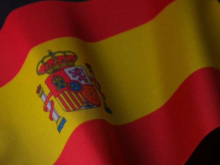 the flag of spain is pictured with a black background