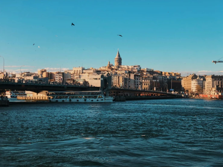 the skyline is very large and there are many boats in the river