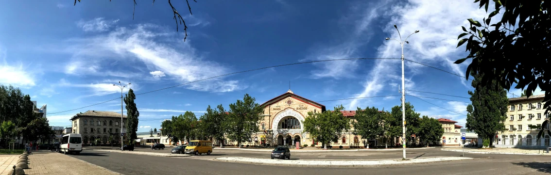 a view of a street from the middle of the day