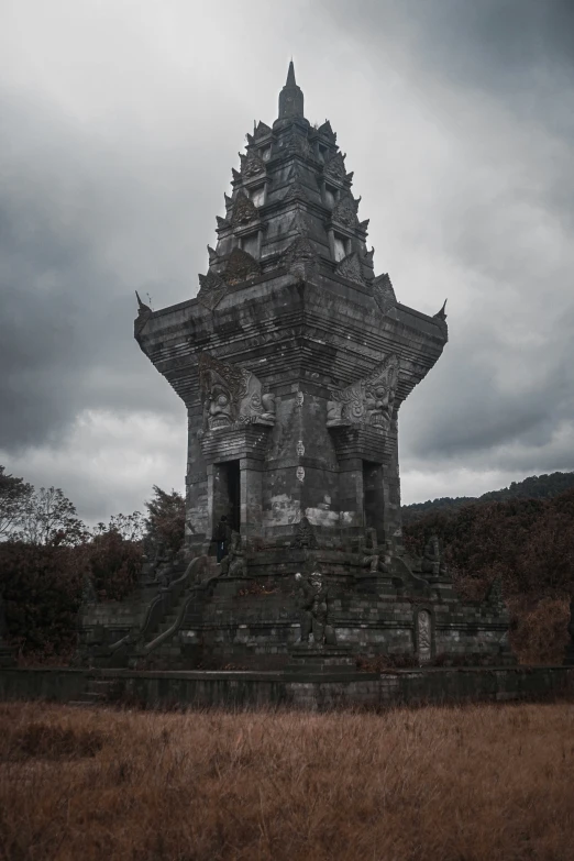 a tall tower structure with a sky background