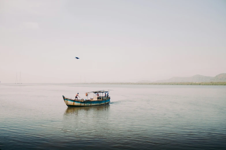 a couple of people that are on a boat