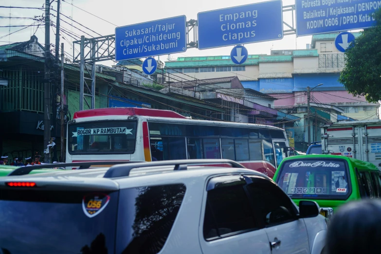 many traffic is backed up at the bus stop