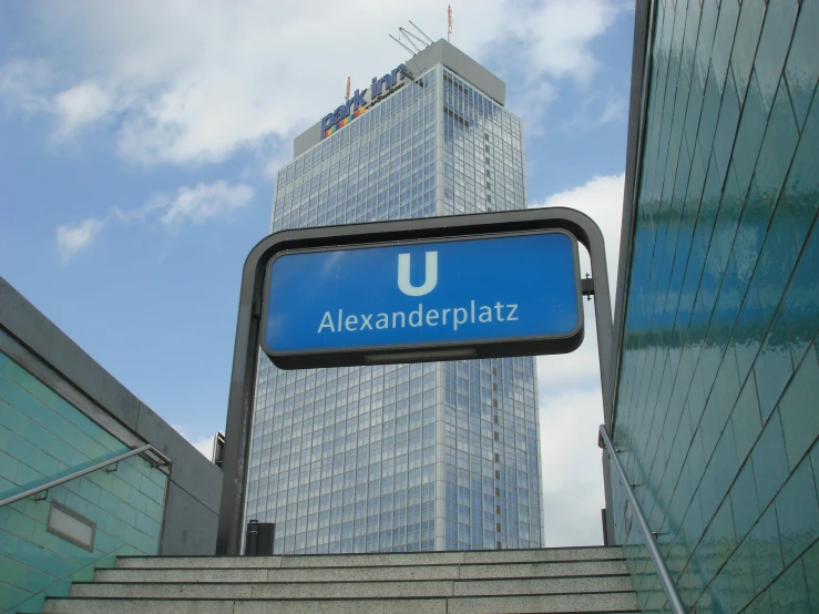 the entrance sign to the underground subway system in new york