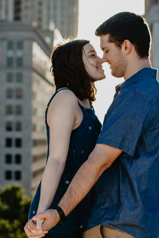 couple emce during engagement session on the waterfront