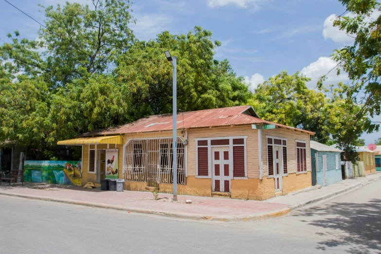 a house sits on the side of the road