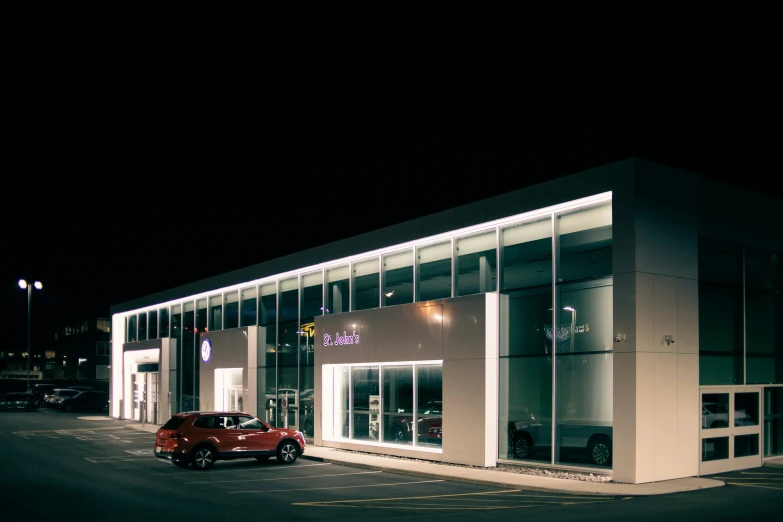 the corner of the empty parking lot at night time