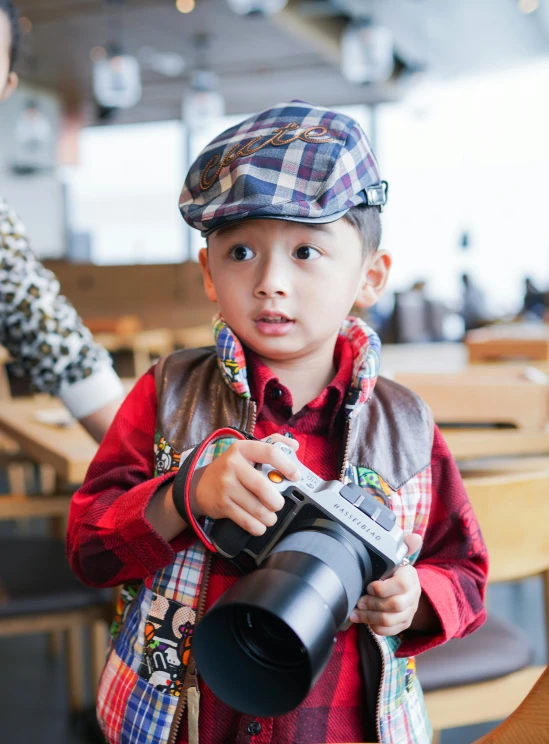 a  is taking a picture with a camera