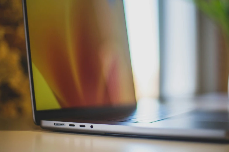 a picture of an open laptop computer on the table