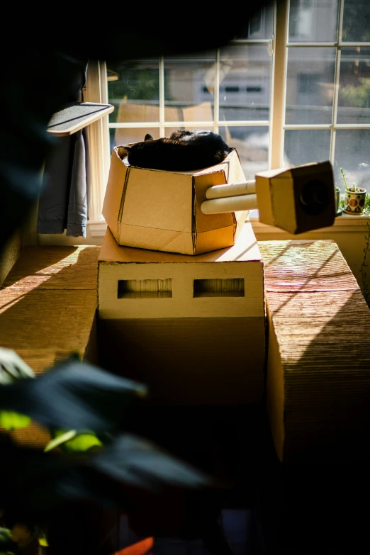 an opened cardboard box sitting on top of a table