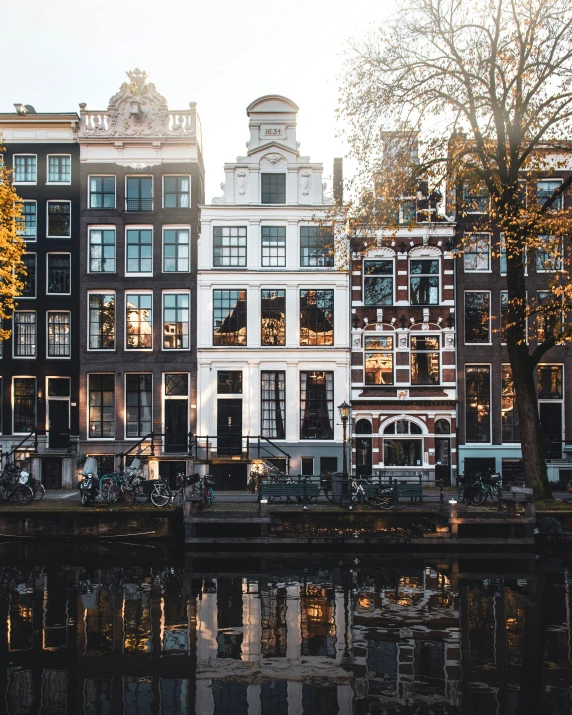 a few buildings next to a body of water