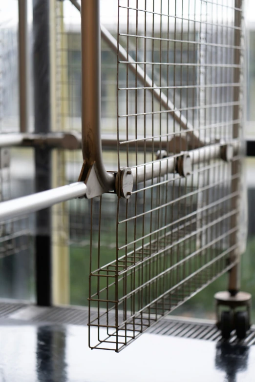 an image of a balcony railing with metal bars