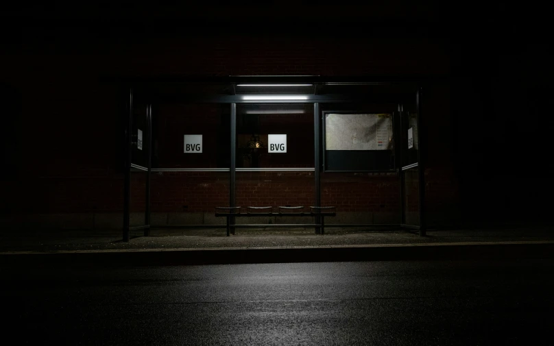 the empty street at night has two closed windows