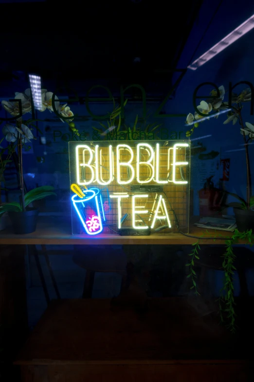 a neon sign that reads bubble tea on it