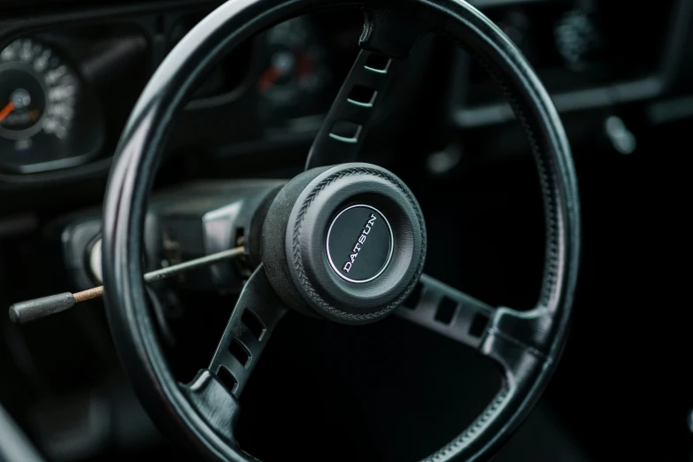 the steering wheel and pedals on an old fashioned car