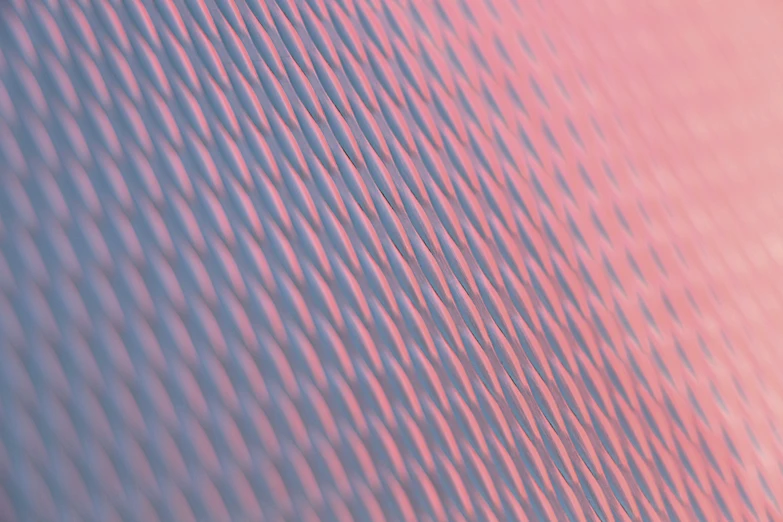 blurred diagonal lines in light blue and pink