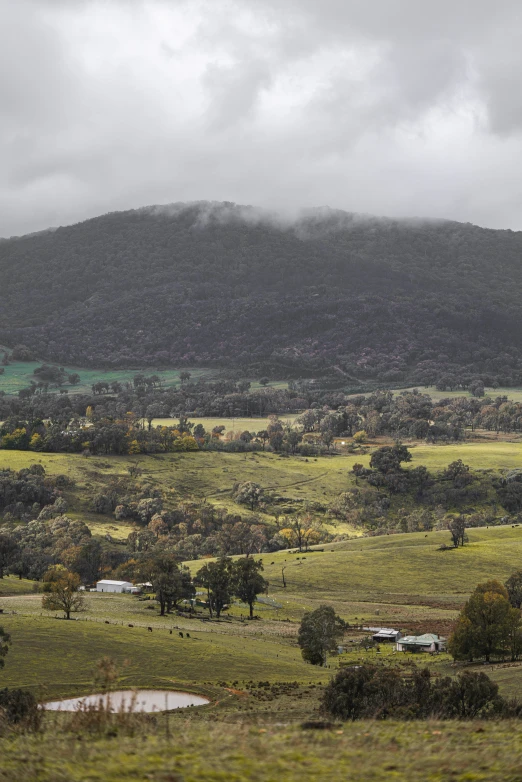 a hilly area with hills in the distance