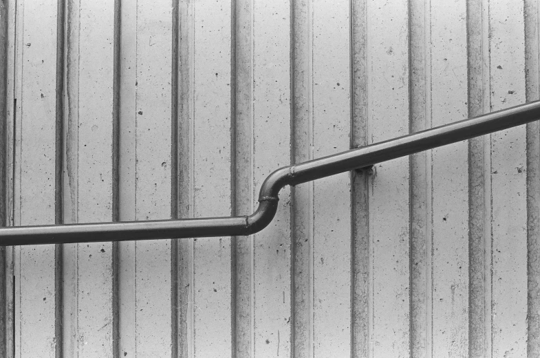 black and white po of a metal staircase railing