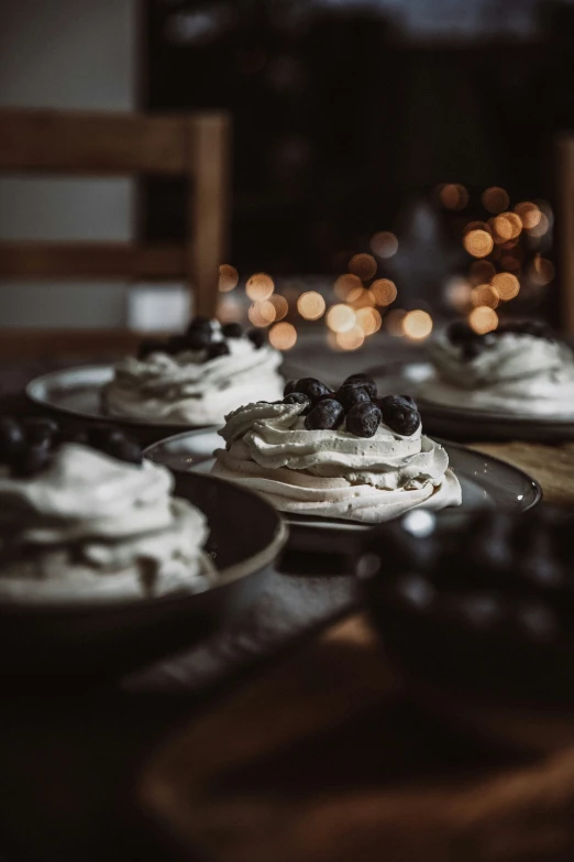 some cake sitting on some plates on a table