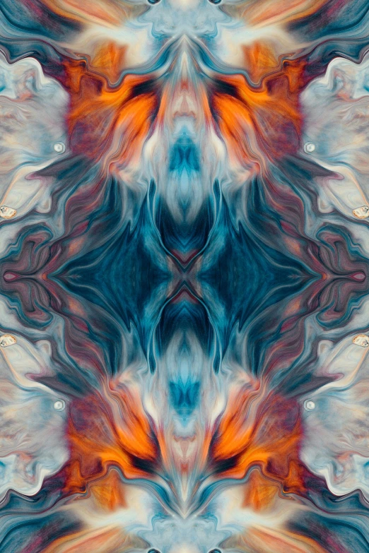 a flower or design with orange, green, red and blue colors