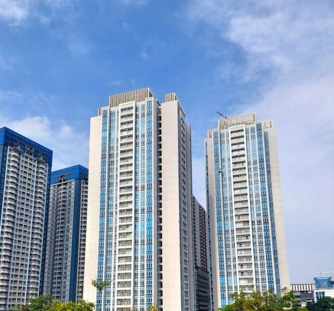 a group of tall white building next to each other