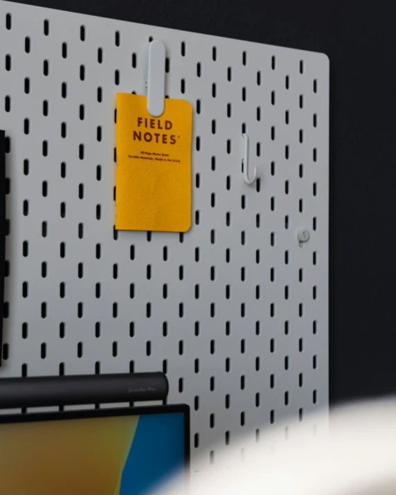 the office folder is marked with a yellow note
