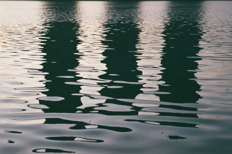 a body of water that has different looking patterns on it