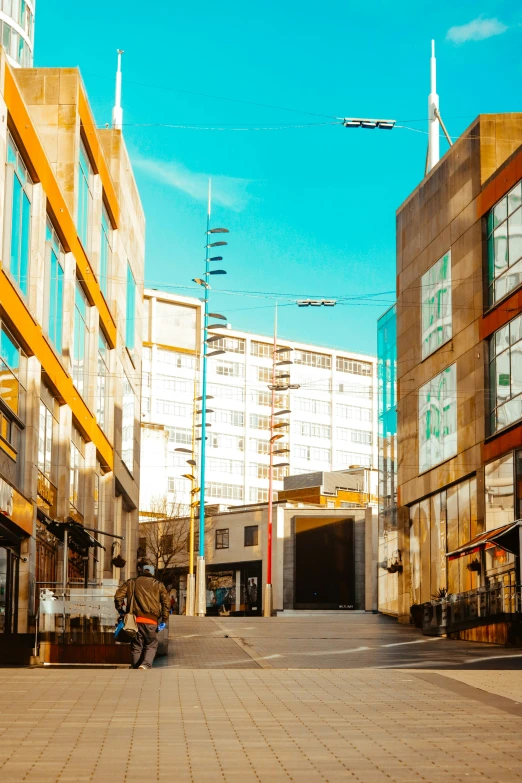 a city street with multiple buildings and street signs