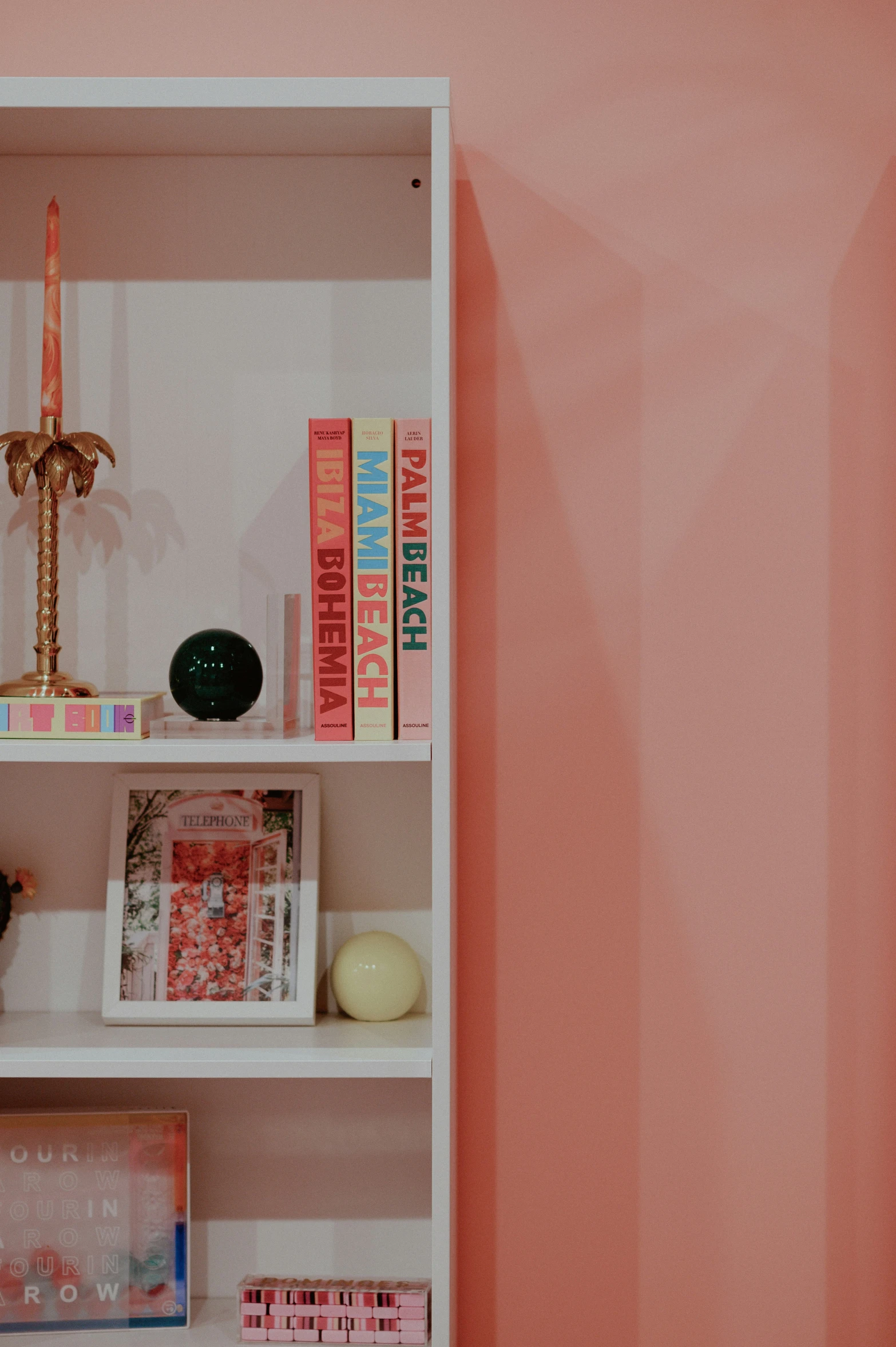 a shelf with a light and other items on it