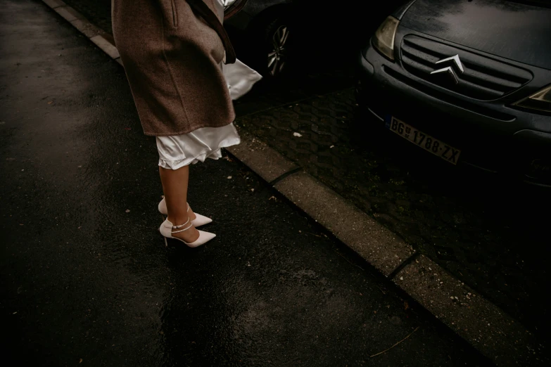 the woman's shoes are white in color