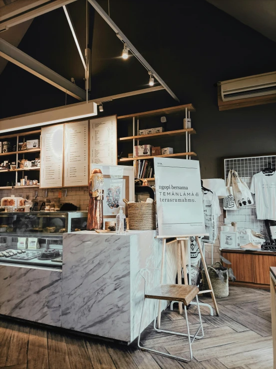 there is an ice cream shop with white marble work