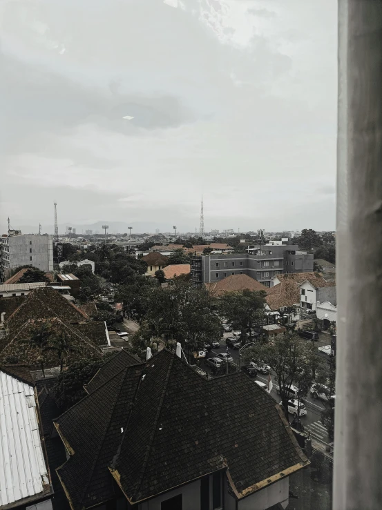 a view from a window with a cloudy sky