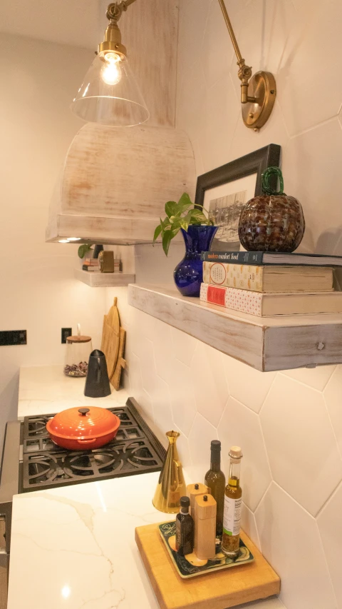 a kitchen with a stove and sink in it