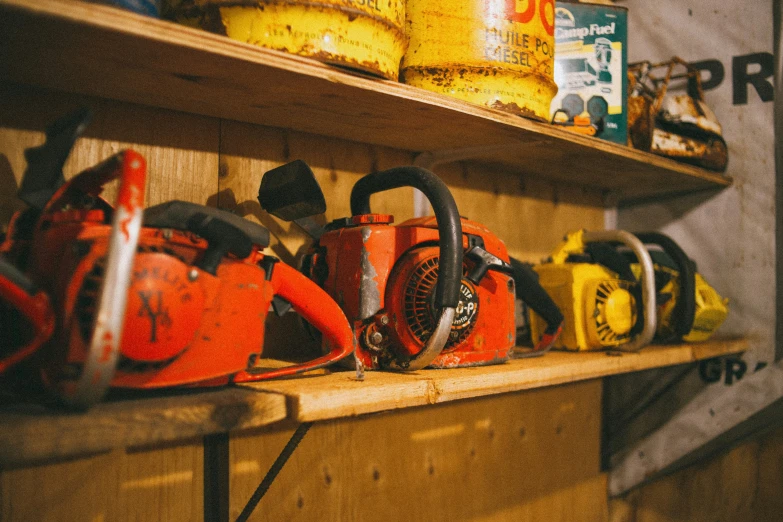 some tools are lined up on a shelf