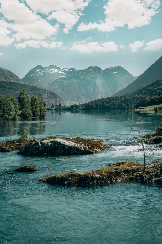 a landscape image with some mountains in the distance