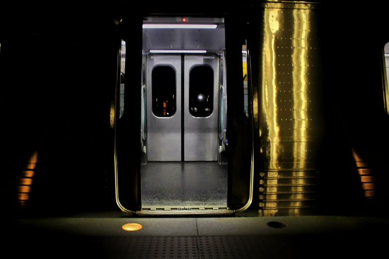 the door of a subway train in a train station
