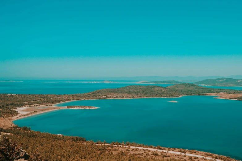 a lake sits empty on a sunny day